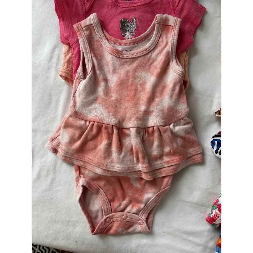 Carters months bodysuits